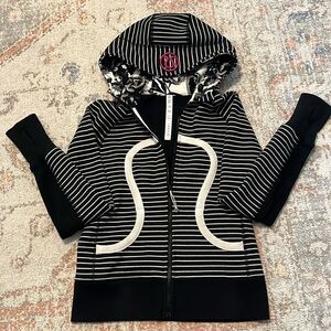 Lululemon Scuba Zip-up Jacket. Women size 6. Black with stripes. Floral hood.